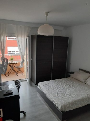 Double bedroom with balcony and private bathroom