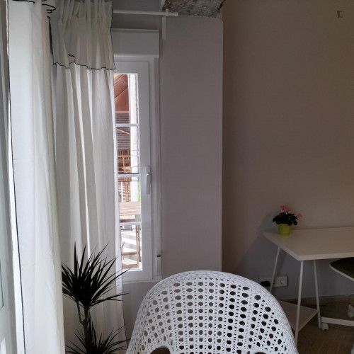 Postiguet Room - Very large sunny room with big bay windows opening to street.