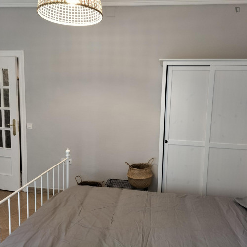 Postiguet Room - Very large sunny room with big bay windows opening to street.