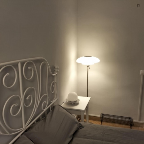 Albufereta Room - Large quiet bedroom with two patio windows.