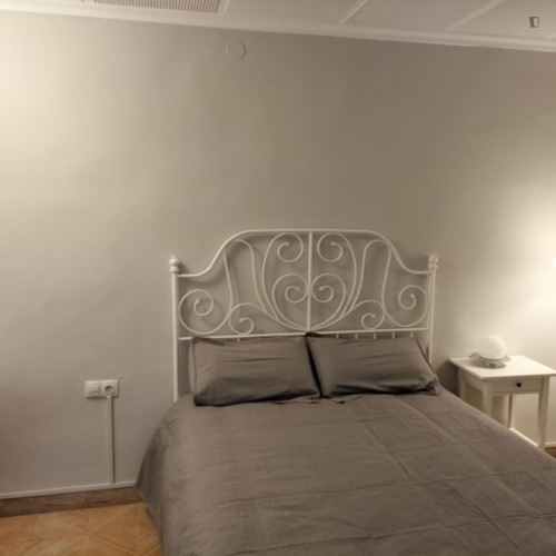 Albufereta Room - Large quiet bedroom with two patio windows.