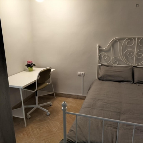 Albufereta Room - Large quiet bedroom with two patio windows.