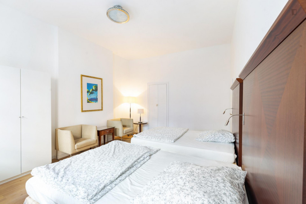 Bed in a homely twin bedroom, in Wedding