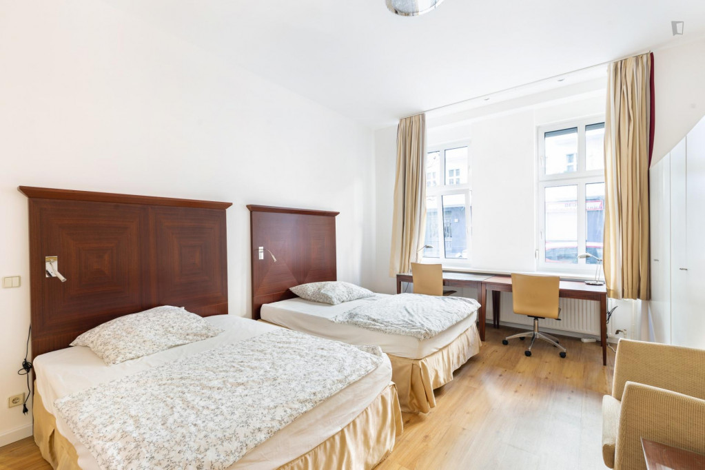Bed in a homely twin bedroom, in Wedding