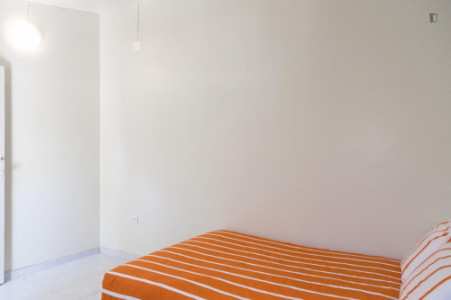 Colourful double bedroom within reach of IST