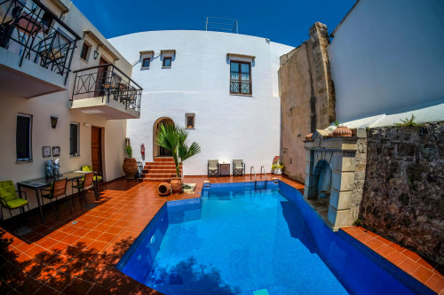 Outstandig Greek Complex w/ Terrace + Pool Home