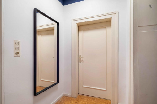 Single bedroom with TV in a 3-bedroom apartment