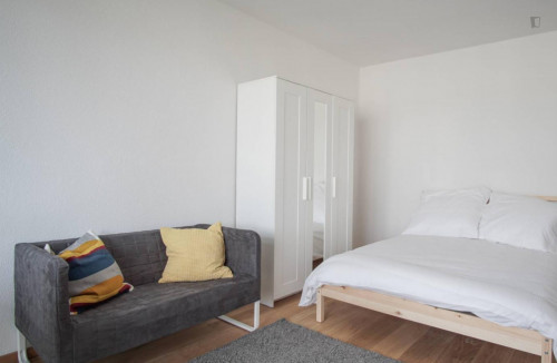 Spacious and stylish double bedroom with balcony