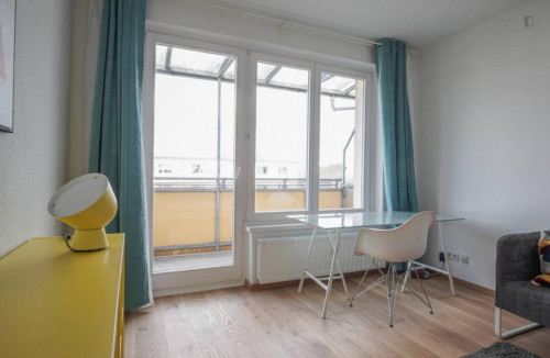 Spacious and stylish double bedroom with balcony